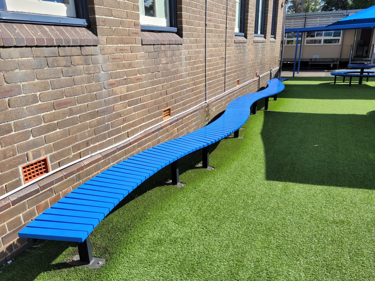 Bright Blue bench installed in serpentine design