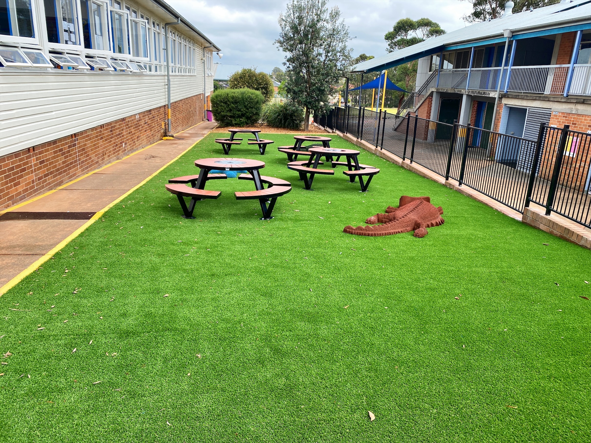 Outdoor settings in a school yard with rubber animal