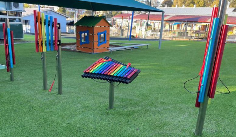 Percussion Play Outdoor Musical Instruments installed in a school playground by Scully Outdoor Designs